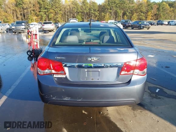 ✅ 2014 Chevrolet Cruze LS • VIN: 1G1PA5SHXE7464206 • Lot: 43599999. Listed on IAAI with 130,122 mi. Free auction sales archive from the USA and detailed vehicle history report at DreamBid. Image 16.