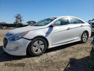 ✅ 2012 Hyundai Sonata Hybrid • VIN: KMHEC4A44CA028142 • Lot: 67149334. Listed on Copart with 128,292 mi. Free auction sales archive from the USA and detailed vehicle history report at DreamBid. Image 1.