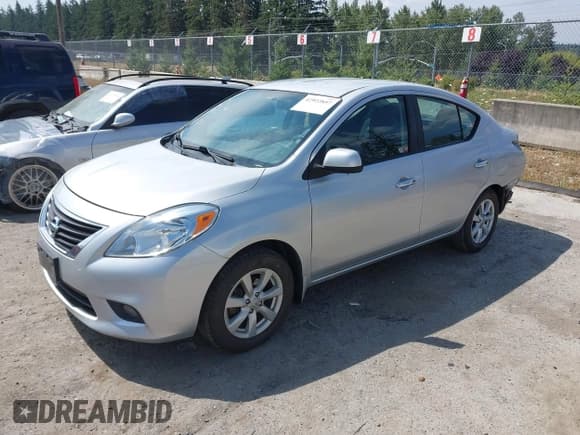 ✅ 2012 Nissan Versa SV • VIN: 3N1CN7AP0CL945804 • Лот: 42922857. Опубликован ранее на IAAI с пробегом 166 540 миль. Бесплатный доступ к архиву аукционных продаж из США и подробный отчёт об истории автомобиля на DreamBid. Изображение 2.