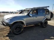 ✅ 1996 Toyota Land Cruiser • VIN: JT3HJ85J0T0145838 • Лот: 77593764. Опубликован ранее на Copart с пробегом 158 507 миль. Бесплатный доступ к архиву аукционных продаж из США и подробный отчёт об истории автомобиля на DreamBid. Изображение 1.