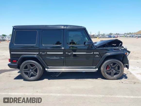 ✅ 2015 Mercedes-Benz G 63 AMG • VIN: WDCYC7DF3FX235410 • Lot: 42310739. Listed on IAAI with Not provided. Free auction sales archive from the USA and detailed vehicle history report at DreamBid. Image 14.