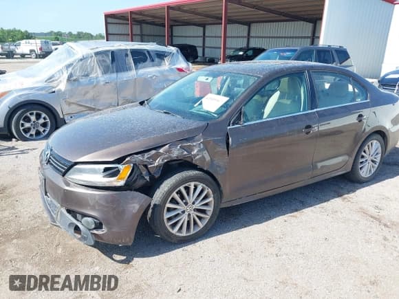 ✅ 2014 Volkswagen Jetta TDI w/Premium/Nav • VIN: 3VWLL7AJ8EM387791 • Lot: 42555967. Listed on IAAI with 218,829 mi. Free auction sales archive from the USA and detailed vehicle history report at DreamBid. Image 2.