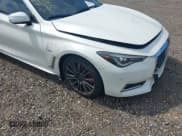 ✅ 2017 Infiniti Q60 Red Sport 400 • VIN: JN1FV7EL1HM702200 • Lot: 42751547. Listed on IAAI with 33,172 mi. Free auction sales archive from the USA and detailed vehicle history report at DreamBid. Image 6.