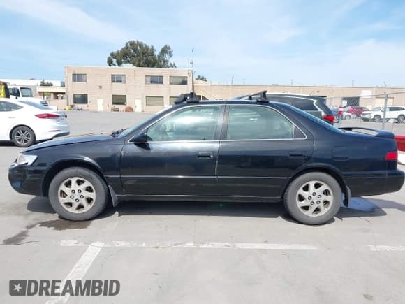 ✅ 1998 Toyota Camry LE • VIN: JT2BF28KXW0118504 • Lot: 42096672. Listed on IAAI with 257,358 mi. Free auction sales archive from the USA and detailed vehicle history report at DreamBid. Image 14.