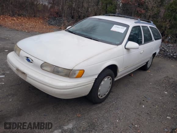 ✅ 1994 Ford Taurus GL • VIN: 1FALP57U4RG263732 • Lot: 43801365. Listed on IAAI with 141,636 mi. Free auction sales archive from the USA and detailed vehicle history report at DreamBid. Image 2.