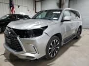 ✅ 2021 Lexus LX 570 • VIN: JTJDY7AX8M4338661 • Lot: 43195495. Listed on Copart with 16,731 mi. Free auction sales archive from the USA and detailed vehicle history report at DreamBid. Image 1.