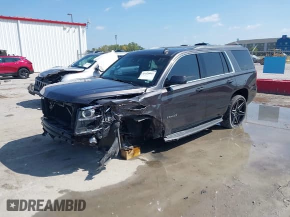 ✅ 2016 Chevrolet Tahoe LT • VIN: 1GNSKBKC6GR389956 • Lot: 43114641. Listed on IAAI with 105,310 mi. Free auction sales archive from the USA and detailed vehicle history report at DreamBid. Image 2.