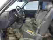 2000 Chevrolet Silverado 1500 LS с VIN 1GCEK19V1YE410387, выставлен на аукционе Copart как лот 85894705 с пробегом 238 126 миль миль и Списание • Salvage title. История ставок и продаж доступна на DreamBid. Изображение 7.