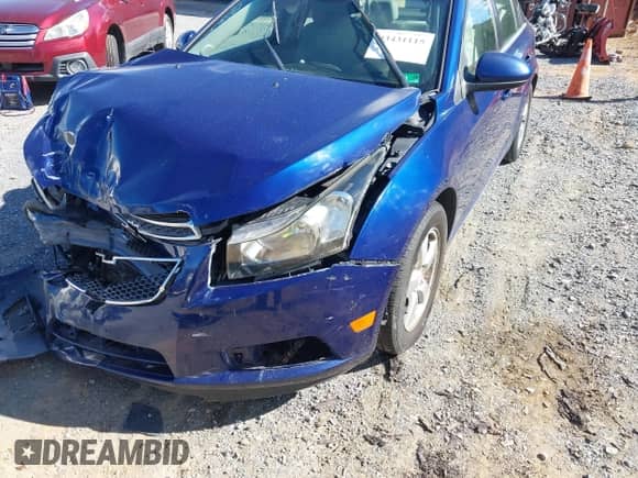 2012 Chevrolet Cruze 1LT z VIN 1G1PF5SC6C7111738, wystawiony jako IAAI lot #43431115 z przebiegiem 203 531 mil mil oraz . Historia ofert i sprzedaży dostępna na DreamBid. Obrazek 6.