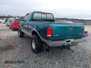 ✅ 1997 Ford F-150 XL • VIN: 1FTEX18L2VND33137 • Lot: 43578023. Wystawiony na IAAI z przebiegiem 148 923 mil. Bezpłatny archiwum sprzedaży aukcyjnych z USA i szczegółowy raport historii pojazdu na DreamBid. Zdjęcie 3.