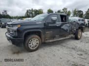 ✅ 2021 Chevrolet Silverado 2500HD High Country • VIN: 1GC4YREY4MF245321 • Лот: 84720235. Опубликован ранее на Copart с пробегом 124 580 миль. Бесплатный доступ к архиву аукционных продаж из США и подробный отчёт об истории автомобиля на DreamBid. Изображение 1.