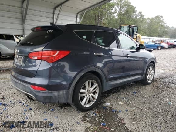 2013 Hyundai Santa Fe Sport z VIN 5XYZU3LAXDG032889, wystawiony jako Copart lot #85541385 z przebiegiem 118 555 mil mil oraz Szkoda całkowita • Salvage title. Historia ofert i sprzedaży dostępna na DreamBid. Obrazek 3.