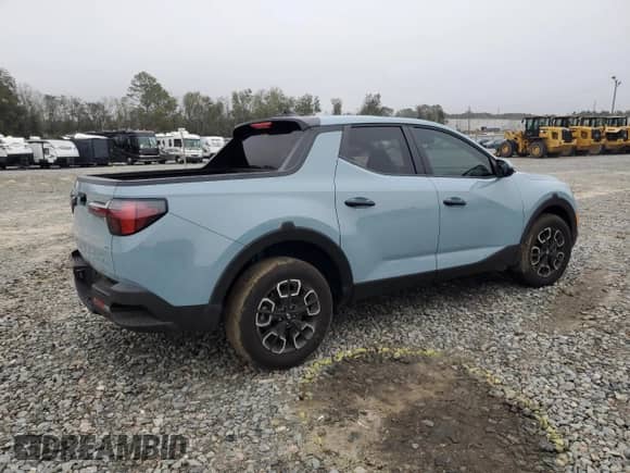 2024 Hyundai Santa Cruz SEL z VIN 5NTJBDDE3RH101529, wystawiony jako Copart lot #79864154 z przebiegiem 2 272 mil mil oraz Szkoda całkowita • Salvage title. Historia ofert i sprzedaży dostępna na DreamBid. Obrazek 3.