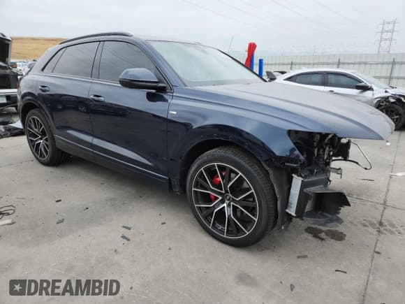 ✅ 2023 Audi Q8 Prestige • VIN: WA1FVBF10PD051745 • Лот: 71208045. Опубликован ранее на Copart с пробегом 14 199 миль. Бесплатный доступ к архиву аукционных продаж из США и подробный отчёт об истории автомобиля на DreamBid. Изображение 4.