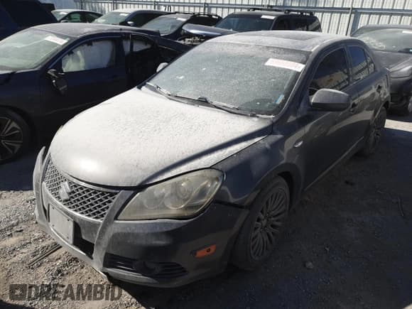 ✅ 2010 Suzuki Kizashi • VIN: JS2RE9A54A6100694 • Лот: 69668084. Опубликован ранее на Copart с пробегом 106 899 миль. Бесплатный доступ к архиву аукционных продаж из США и подробный отчёт об истории автомобиля на DreamBid. Изображение 1.