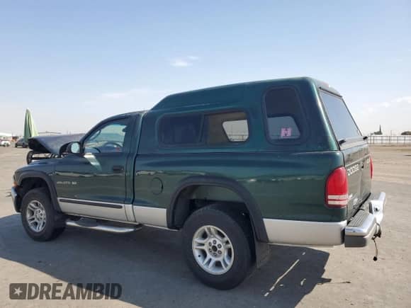 2001 Dodge Dakota Sport z VIN 1B7GG26N81S262671, wystawiony jako Copart lot #71080995 z przebiegiem 145 480 mil mil oraz Szkoda całkowita • Salvage title. Historia ofert i sprzedaży dostępna na DreamBid. Obrazek 2.