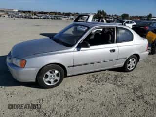 2002 Hyundai Accent with VIN KMHCF35G62U203274, listed as a Copart auction lot 77047834 with 90,442 mi miles and Salvage title. Bid and sale history available at DreamBid. Image 1.
