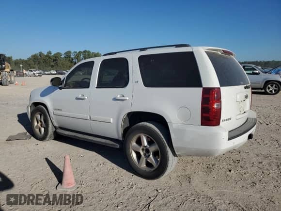2008 Chevrolet Tahoe 2LT with VIN 1GNFC13048R268387, listed as a Copart auction lot 87075985 with 215,039 mi miles and Salvage title. Bid and sale history available at DreamBid. Image 2.