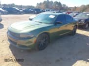 ✅ 2023 Dodge Charger SXT • VIN: 2C3CDXBG1PH592331 • Lot: 43713215. Listed on IAAI with 37,011 mi. Free auction sales archive from the USA and detailed vehicle history report at DreamBid. Image 18.