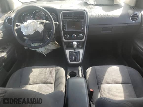 2011 Dodge Caliber Mainstreet with VIN 1B3CB3HA3BD237813, listed as a Copart auction lot 81101125 with 107,628 mi miles and Salvage title. Bid and sale history available at DreamBid. Image 8.