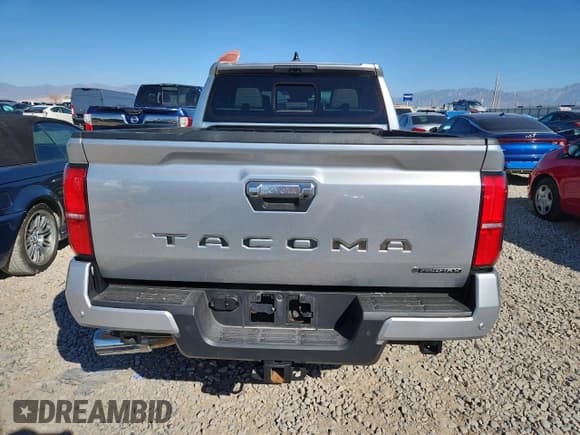 ✅ 2025 Toyota Tacoma Limited Hybrid • VIN: 3TYLC5LNXST018261 • Lot: 81774295. Listed on Copart with 8,605 mi. Free auction sales archive from the USA and detailed vehicle history report at DreamBid. Image 6.