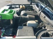 ✅ 2004 Cadillac Escalade • VIN: 1GYEK63N14R200973 • Lot: 42926800. Listed on IAAI with 261,068 mi. Free auction sales archive from the USA and detailed vehicle history report at DreamBid. Image 12.