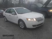 ✅ 2012 Lincoln MKZ • VIN: 3LNHL2JC2CR825682 • Lot: 43758145. Listed on IAAI with 199,567 mi. Free auction sales archive from the USA and detailed vehicle history report at DreamBid. Image 1.