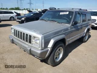 ✅ 2001 Jeep Cherokee Sport • VIN: 1J4FF58S61L540796 • Lot: 62384895. Listed on Copart with 209,294 mi. Free auction sales archive from the USA and detailed vehicle history report at DreamBid. Image 1.