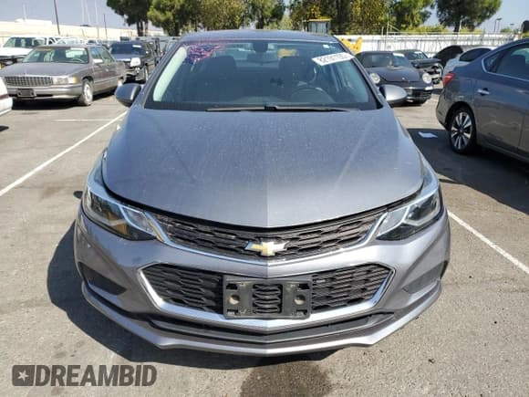 ✅ 2018 Chevrolet Cruze LT • VIN: 1G1BE5SM8J7117530 • Lot: 82191105. Listed on Copart with 81,767 mi. Free auction sales archive from the USA and detailed vehicle history report at DreamBid. Image 5.