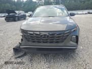 ✅ 2022 Hyundai Tucson SEL • VIN: 5NMJC3AE2NH090797 • Lot: 69818944. Wystawiony na Copart z przebiegiem 16 131 mil. Bezpłatny archiwum sprzedaży aukcyjnych z USA i szczegółowy raport historii pojazdu na DreamBid. Zdjęcie 5.