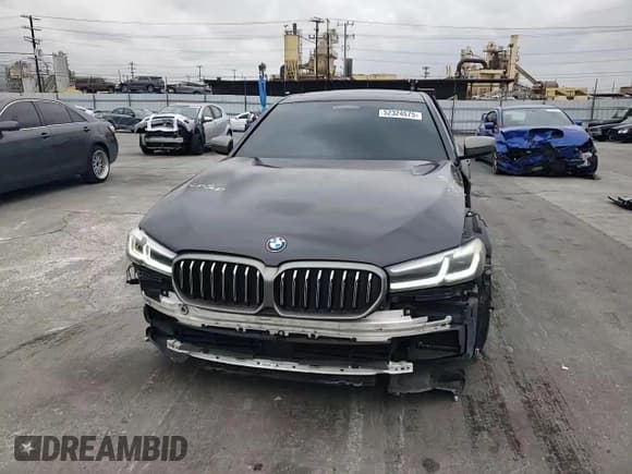 ✅ 2022 BMW 5 Series M550i xDrive • VIN: WBA13BK01NCH78575 • Лот: 52324675. Опубликован ранее на Copart с пробегом 56 539 миль. Бесплатный доступ к архиву аукционных продаж из США и подробный отчёт об истории автомобиля на DreamBid. Изображение 10.
