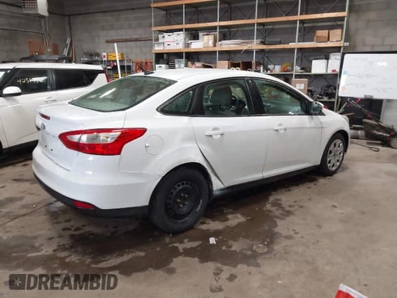 ✅ 2012 Ford Focus SE • VIN: 1FAHP3F21CL301085 • Lot: 42321328. Listed on IAAI with 157,818 mi. Free auction sales archive from the USA and detailed vehicle history report at DreamBid. Image 4.