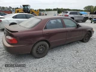 ✅ 2000 Mazda 626 LX • VIN: 1YVGF22D8Y5126950 • Lot: 69440124. Wystawiony na Copart z przebiegiem 208 584 mil. Bezpłatny archiwum sprzedaży aukcyjnych z USA i szczegółowy raport historii pojazdu na DreamBid. Zdjęcie 3.