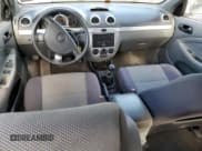 ✅ 2007 Suzuki Reno • VIN: KL5JD66Z57K670570 • Лот: 79906524. Опубликован ранее на Copart с пробегом 126 550 миль. Бесплатный доступ к архиву аукционных продаж из США и подробный отчёт об истории автомобиля на DreamBid. Изображение 8.