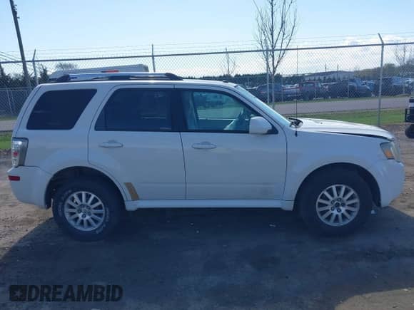 2010 Mercury Mariner Premier with VIN 4M2CN9H7XAKJ26886, listed as a IAAI auction lot 42027825 with 149,561 mi miles and . Bid and sale history available at DreamBid. Image 13.