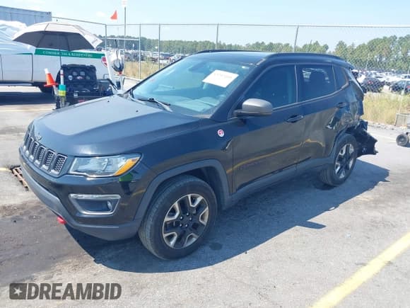 ✅ 2017 Jeep Compass Trailhawk • VIN: 3C4NJDDB7HT651906 • Lot: 43252109. Listed on IAAI with 76,217 mi. Free auction sales archive from the USA and detailed vehicle history report at DreamBid. Image 17.