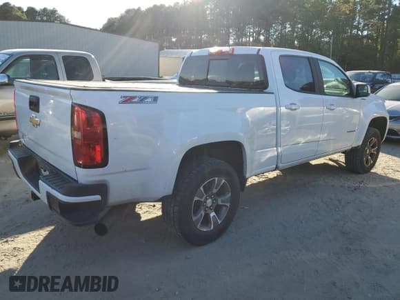 ✅ 2018 Chevrolet Colorado 4WD Z71 • VIN: 1GCPTDE12J1320964 • Лот: 74100024. Опубликован ранее на Copart с пробегом 105 929 миль. Бесплатный доступ к архиву аукционных продаж из США и подробный отчёт об истории автомобиля на DreamBid. Изображение 3.