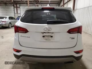 ✅ 2017 Hyundai Santa Fe 2.4L • VIN: 5NMZUDLB7HH052415 • Лот: 60567374. Опубликован ранее на Copart с пробегом 78 291 миль. Бесплатный доступ к архиву аукционных продаж из США и подробный отчёт об истории автомобиля на DreamBid. Изображение 6.
