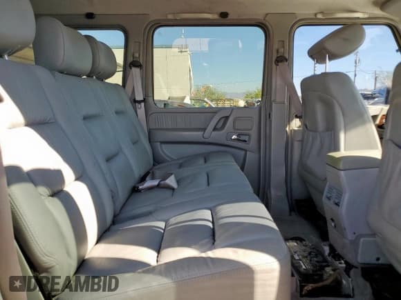 ✅ 2002 Mercedes-Benz G 500 • VIN: WDCYR49EX2X128555 • Lot: 80646805. Wystawiony na Copart z przebiegiem 227 142 mil. Bezpłatny archiwum sprzedaży aukcyjnych z USA i szczegółowy raport historii pojazdu na DreamBid. Zdjęcie 11.