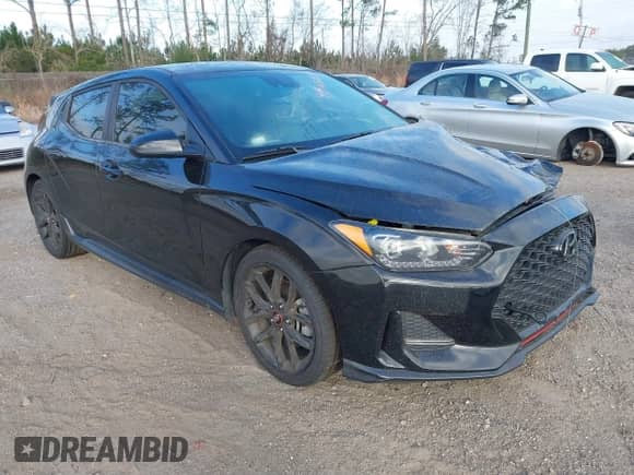 2019 Hyundai Veloster Turbo z VIN KMHTH6AB9KU005942, wystawiony jako IAAI lot #41565229 z przebiegiem 91 788 mil mil oraz . Historia ofert i sprzedaży dostępna na DreamBid. Obrazek 1.