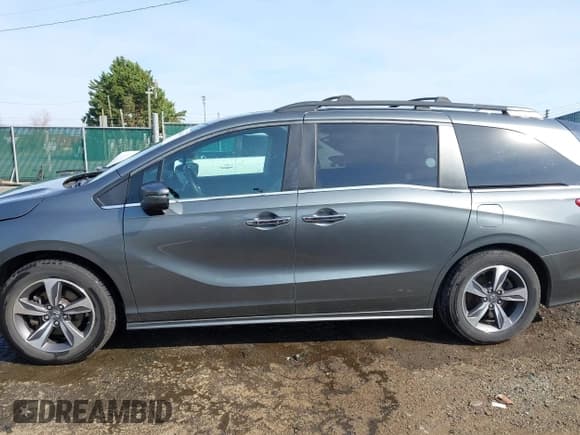 ✅ 2018 Honda Odyssey Touring • VIN: 5FNRL6H85JB044090 • Lot: 43648114. Wystawiony na IAAI z przebiegiem 153 287 mil. Bezpłatny archiwum sprzedaży aukcyjnych z USA i szczegółowy raport historii pojazdu na DreamBid. Zdjęcie 14.