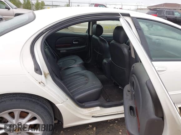 ✅ 1999 Chrysler LHS • VIN: 2C3HC56G0XH626928 • Lot: 42988849. Listed on IAAI with 68,956 mi. Free auction sales archive from the USA and detailed vehicle history report at DreamBid. Image 8.