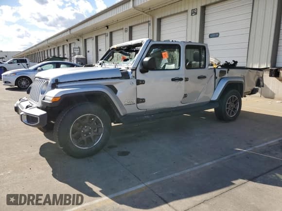 ✅ 2022 Jeep Gladiator Overland • VIN: 1C6HJTFG7NL161576 • Lot: 87017355. Listed on Copart with 61,476 mi. Free auction sales archive from the USA and detailed vehicle history report at DreamBid. Image 1.