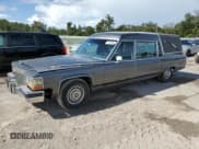 ✅ 1988 Cadillac Brougham • VIN: 1G6DW51Y2J9714052 • Lot: 77274064. Wystawiony na Copart z przebiegiem 69 106 mil. Bezpłatny archiwum sprzedaży aukcyjnych z USA i szczegółowy raport historii pojazdu na DreamBid. Zdjęcie 1.