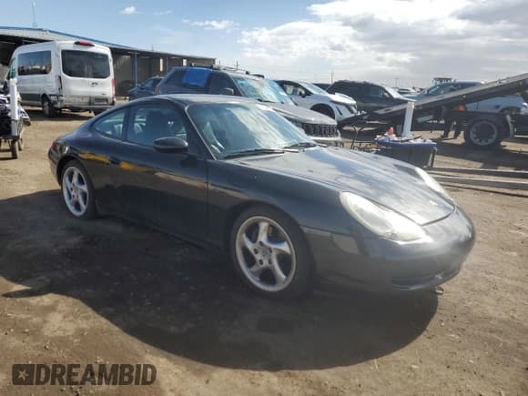 ✅ 2000 Porsche 911 • VIN: WP0AA2998YS621906 • Лот: 47844575. Опубликован ранее на Copart с пробегом 89 531 миль. Бесплатный доступ к архиву аукционных продаж из США и подробный отчёт об истории автомобиля на DreamBid. Изображение 4.