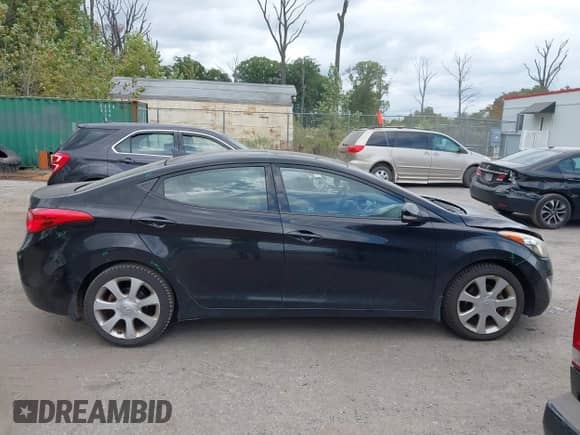 2013 Hyundai Elantra GLS z VIN KMHDH4AE0DU927201, wystawiony jako IAAI lot #43383253 z przebiegiem 117 024 mil mil oraz . Historia ofert i sprzedaży dostępna na DreamBid. Obrazek 13.