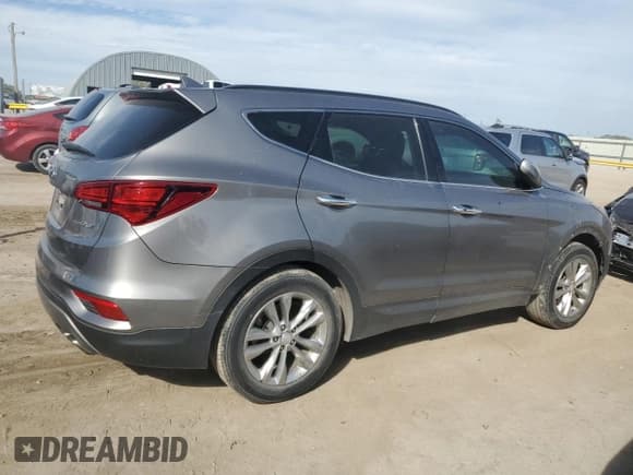 ✅ 2017 Hyundai Santa Fe 2.0T • VIN: 5NMZU4LA5HH041467 • Lot: 81898505. Listed on Copart with 121,360 mi. Free auction sales archive from the USA and detailed vehicle history report at DreamBid. Image 3.