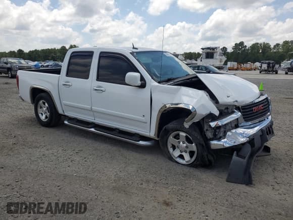 ✅ 2009 GMC Canyon SLE2 • VIN: 1GTCS13EX98120987 • Lot: 65825145. Listed on Copart with 205,072 mi. Free auction sales archive from the USA and detailed vehicle history report at DreamBid. Image 4.