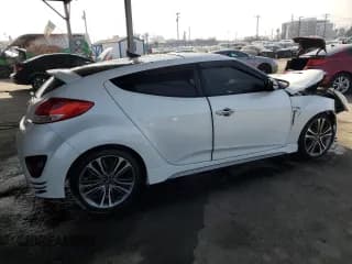 ✅ 2016 Hyundai Veloster Turbo • VIN: KMHTC6AEXGU287461 • Lot: 86125784. Wystawiony na Copart z przebiegiem 110 159 mil. Bezpłatny archiwum sprzedaży aukcyjnych z USA i szczegółowy raport historii pojazdu na DreamBid. Zdjęcie 3.