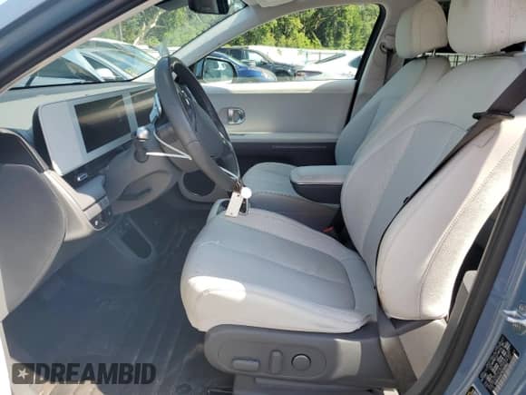 2022 Hyundai Ioniq 5 SEL z VIN KM8KN4AE7NU050692, wystawiony jako Copart lot #61981404 z przebiegiem 21 728 mil mil oraz Szkoda całkowita • Salvage title. Historia ofert i sprzedaży dostępna na DreamBid. Obrazek 7.